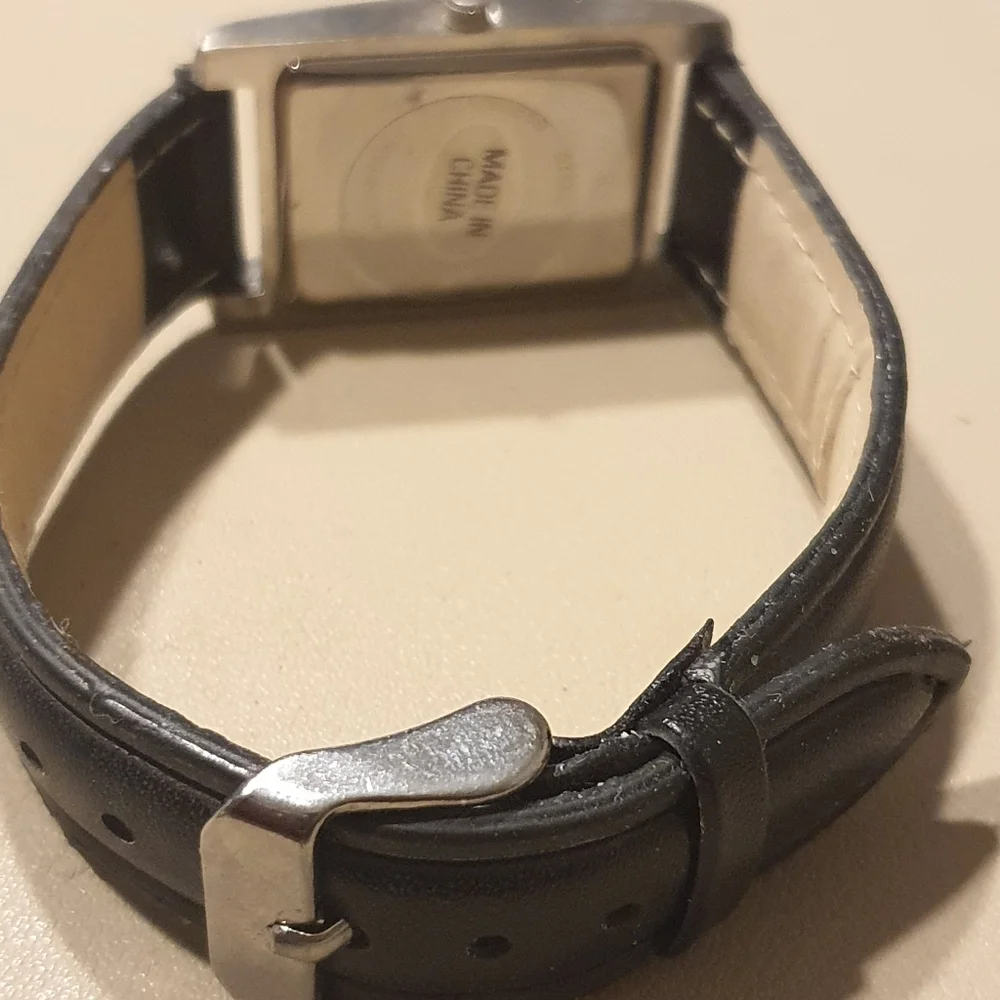 10/$20 Newegg.com Silver/Black Leather Promotional Men's Tank Watch
